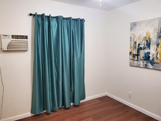 BEDROOM #3- Queen Bed
Wall AC.