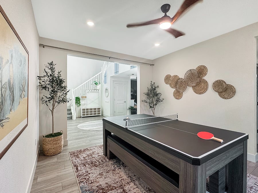 Entertainment room with convertible Pool/Ping-pong table and record player.