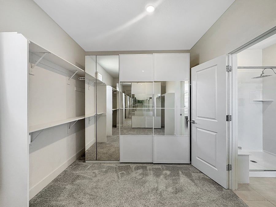 Huge ensuite walk-in closet with luxury IKEA system