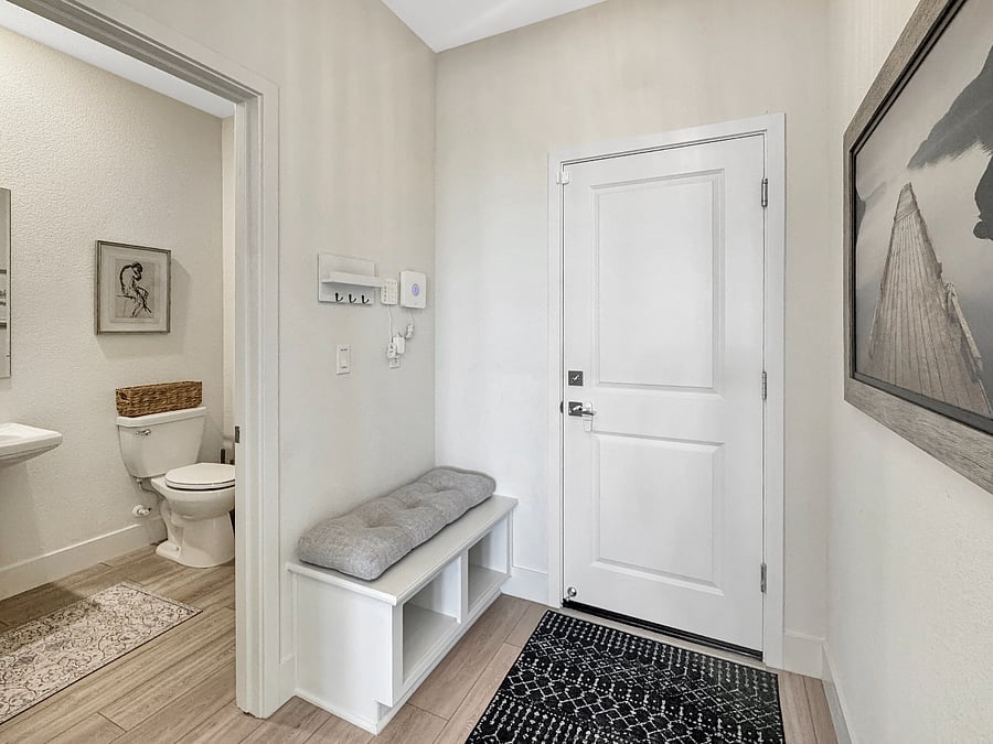 Entrance nook from the garage and access to the downstairs half-bath.
