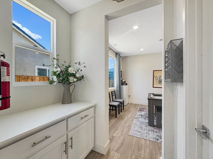 Nook between entrainment room and kitchen next to a huge walk-in pantry.