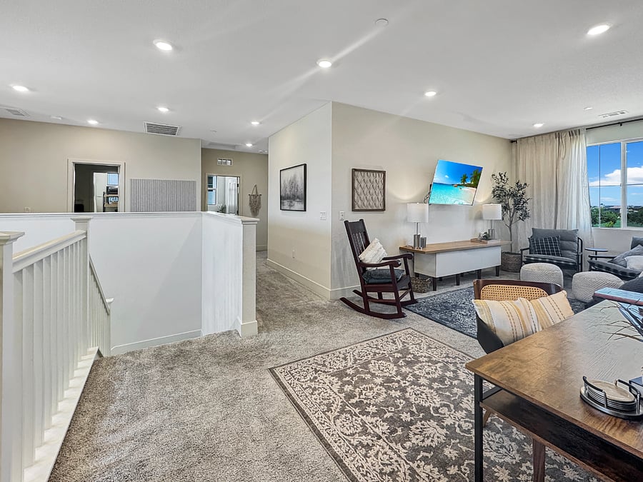 Cozy loft with smart tv, leather recliner, custom rocking chair, comfy side chairs, and task table and chair. Featuring a great view of the park!Cozy loft with smart tv, leather recliner, custom rocking chair, comfy side chairs, and task table and chair. Featuring a great view of the park!