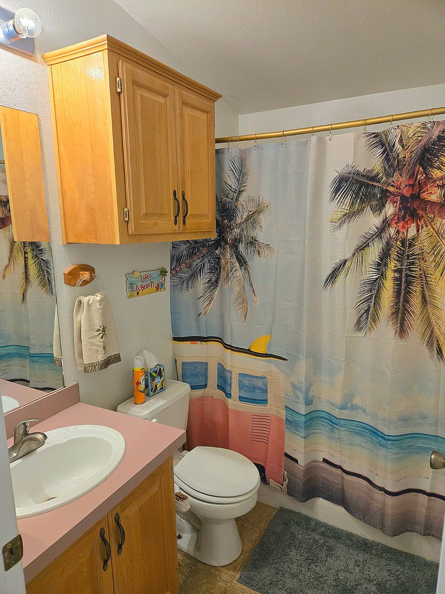 Private bathroom located across the hall