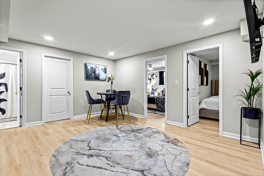 Additional common area with smart tv, seperate laundry room with washer and dryer. 