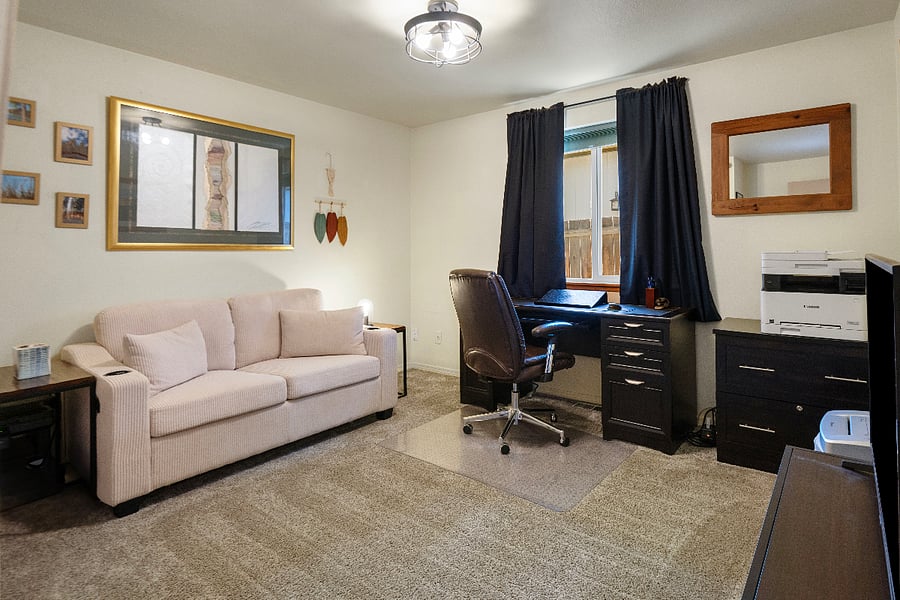 Downstairs Guest Bedroom w/ twin sleeper sofa, dedicated workspace and Smart TV