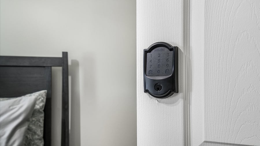 All bedroom doors have this security door/alarm.
