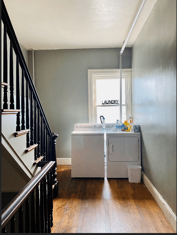Laundry in outside hallway area. 