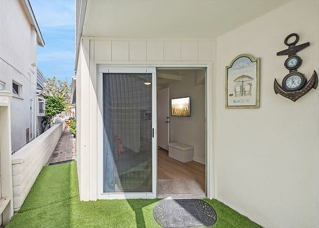 Back door, goes to garage with laundry and parking spot. 
