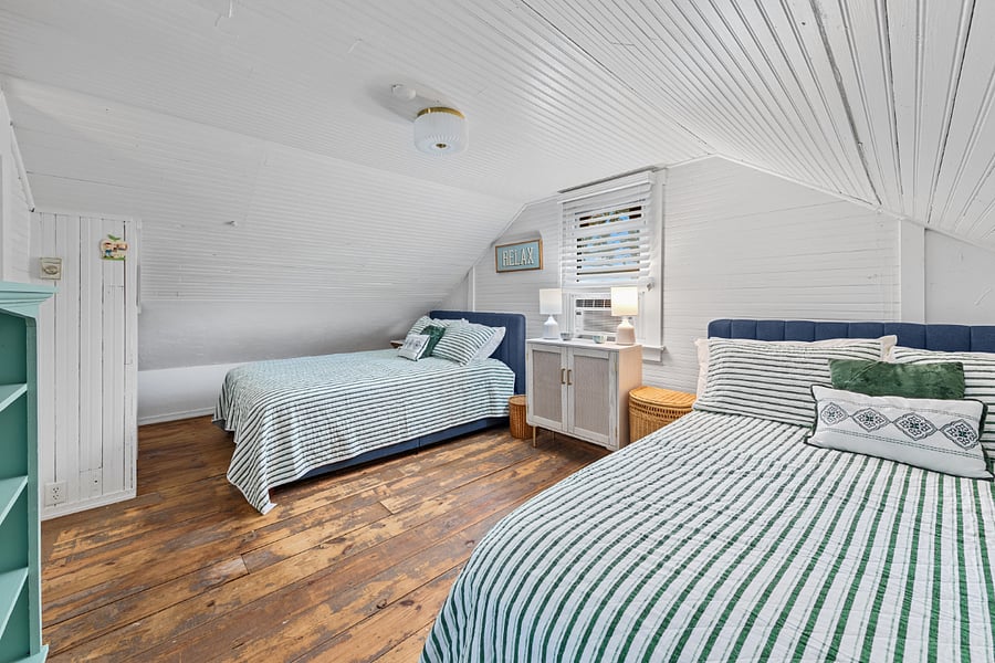 Second Floor Primary Suite . Offers two Queen beds with full bathroom. 