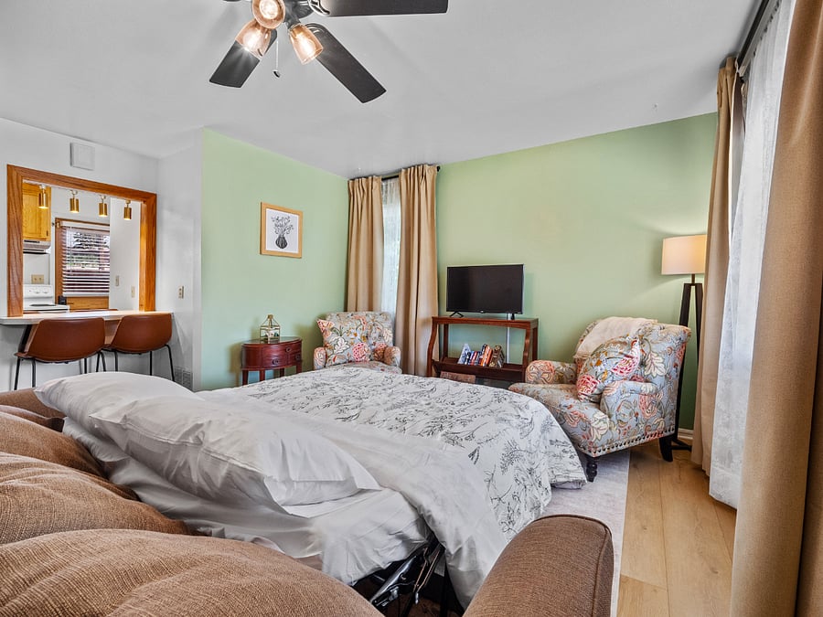The living room includes a couch bed that can accommodate an extra child or temporary house guest.