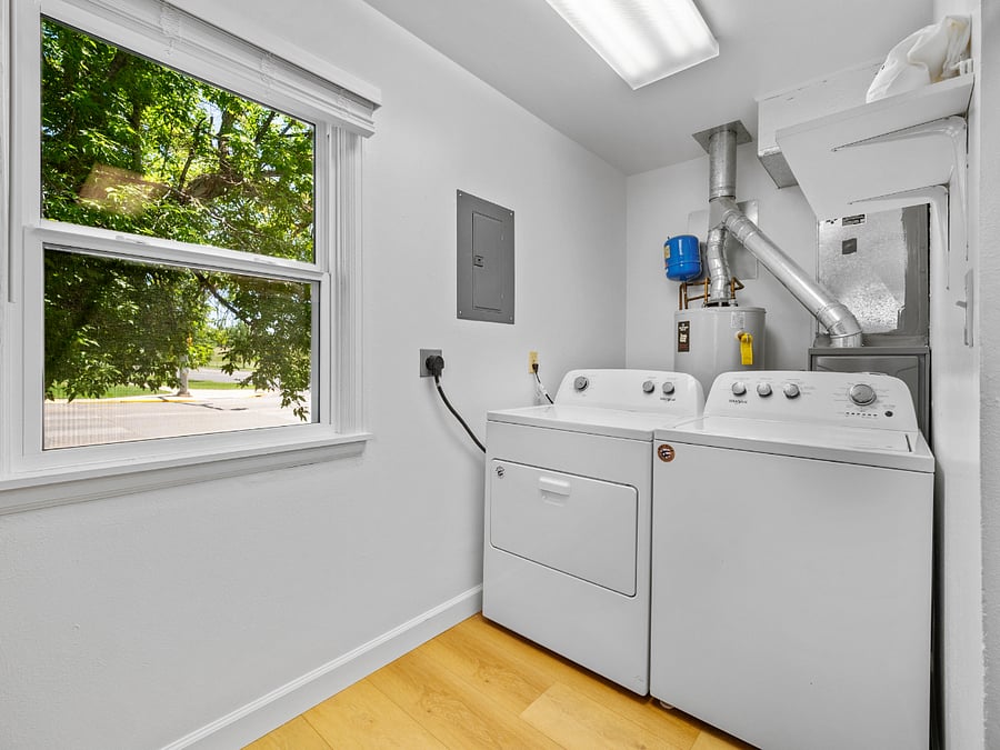 Full-sized in-unit laundry comes with a starter kit of detergent, stain remover, and dryer balls.