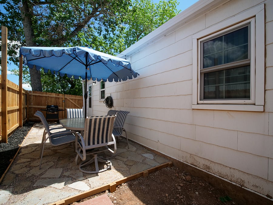 The outside patio is equipped for summer grilling.