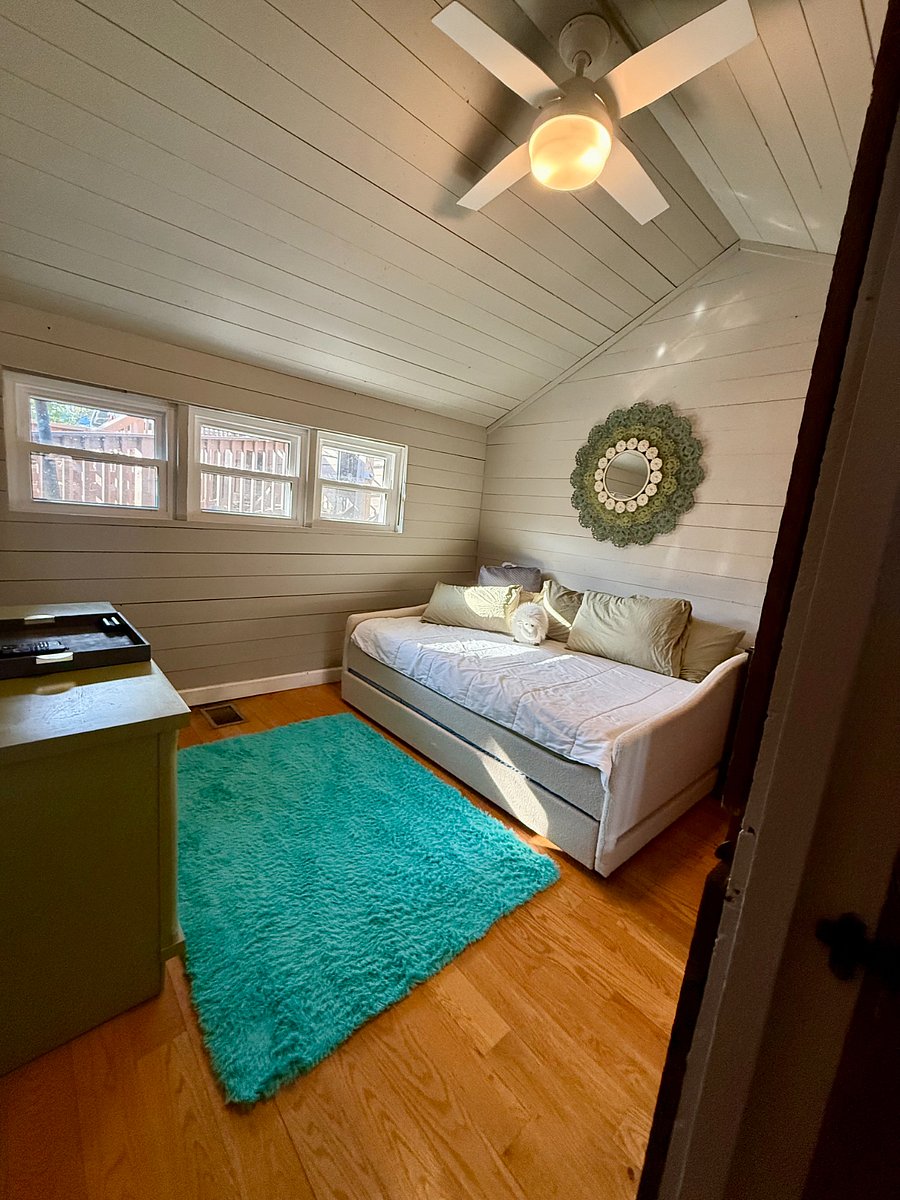 Second bedroom has a smart TV and ceiling fan
