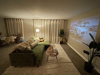 Upstairs living room couch + projector for epic watching