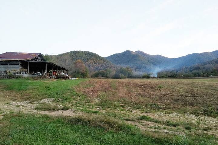 View of driveway and mountains