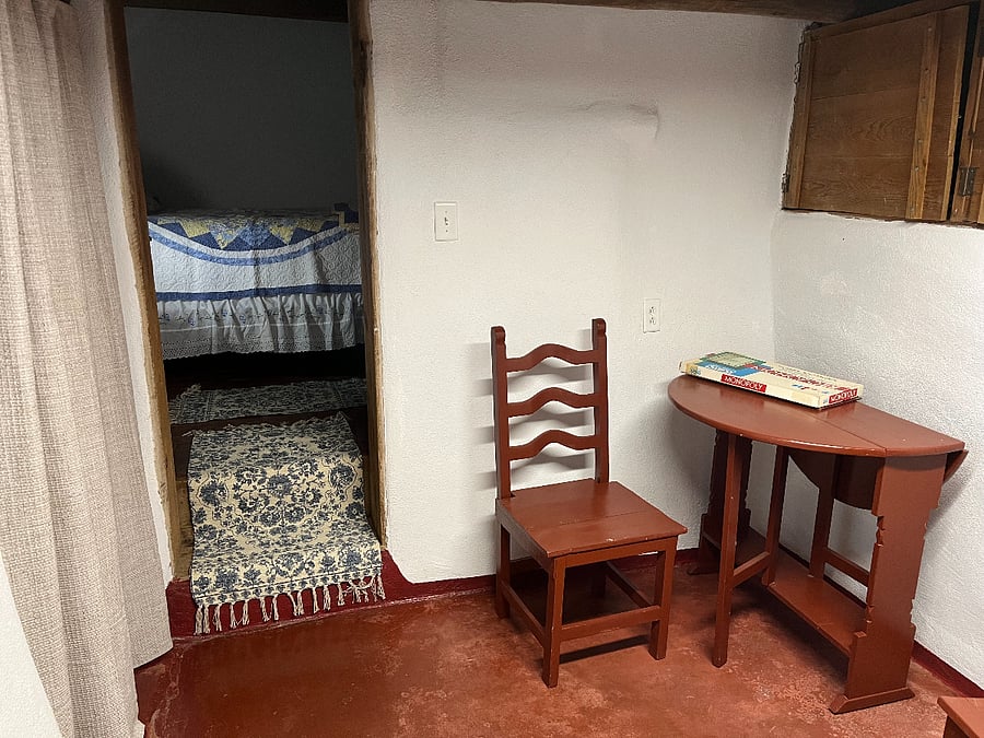 Two steps up to the bedroom.
