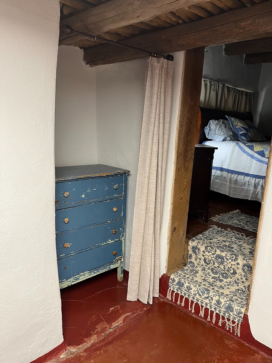 Dresser behind a curtain