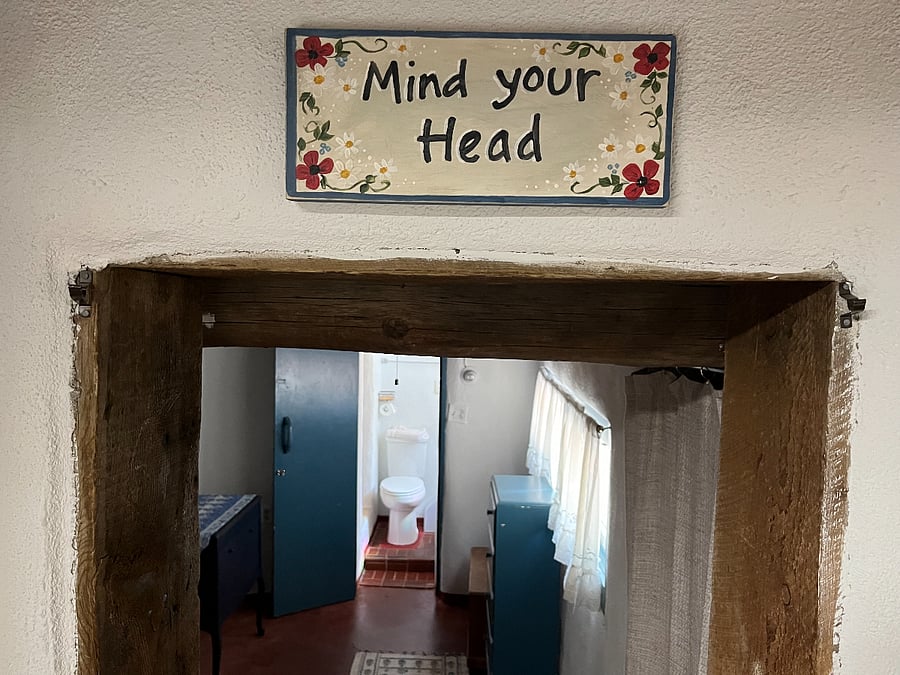 The door way is very low on the bedroom side. 