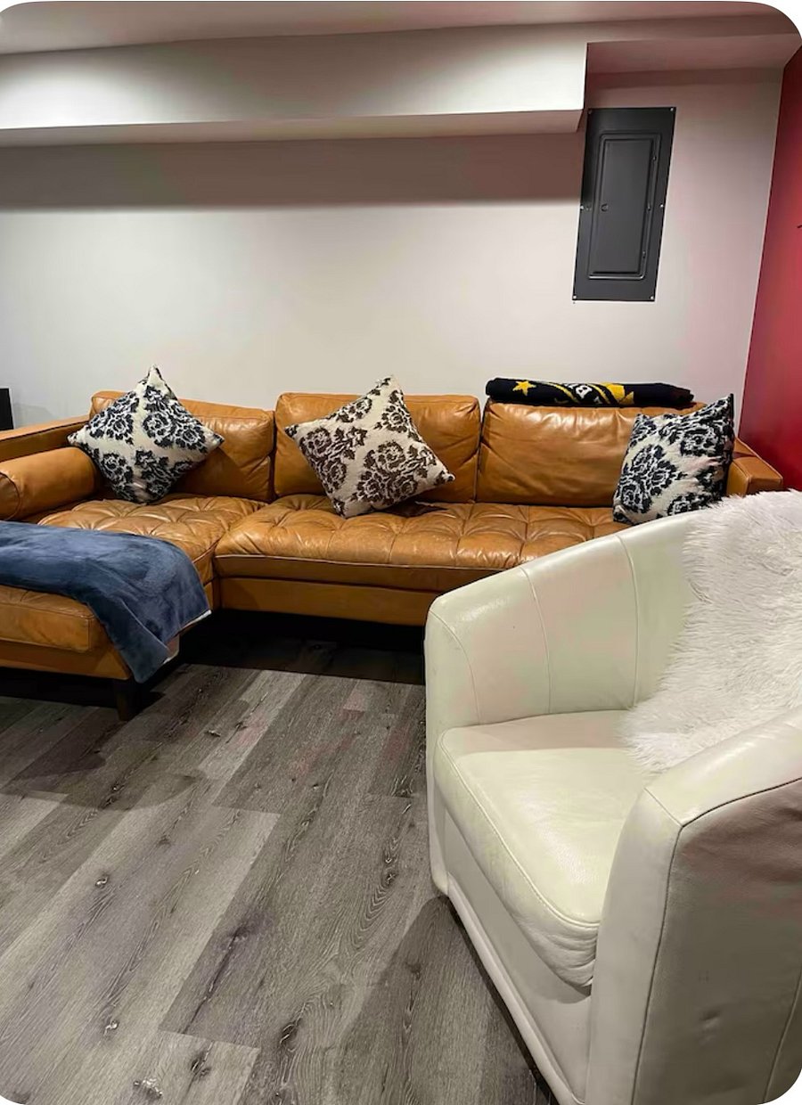 TV room w/ sectional couch, perfect for a cozy night in!