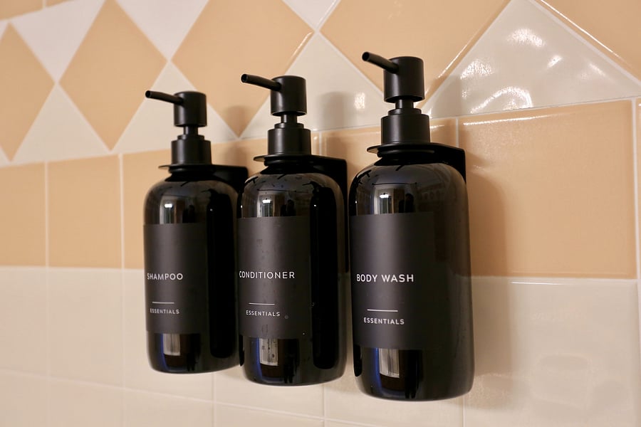 Built-in and stocked shampoo, conditioner and body wash dispensers