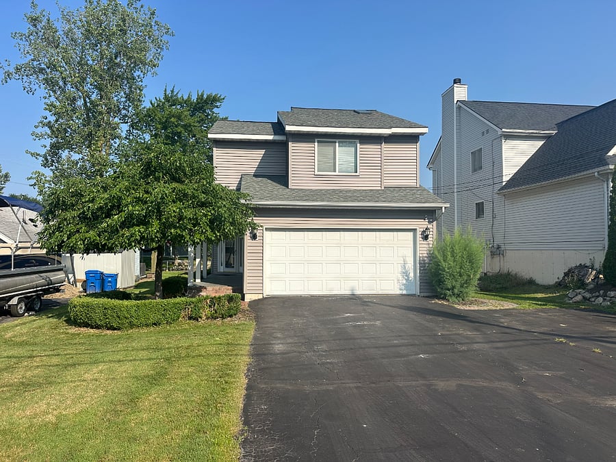 Huge driveway for up to 6 cars. *Note that garage is not usable