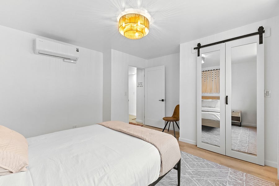Unit A Bedroom Mirror Closet entrance view