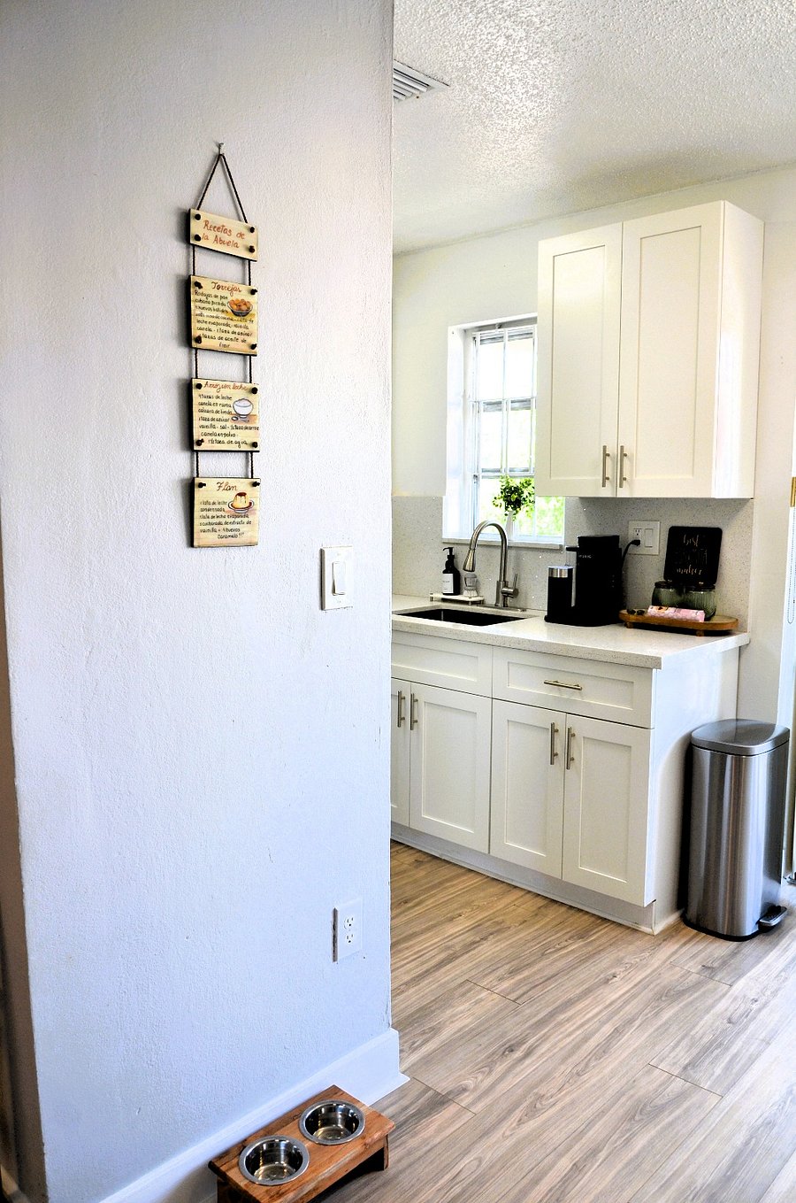 You will instantly feel at home with cozy touches like grandma's delightful Cuban dessert recipes adorning the walls and a cheerful, inviting, and spacious kitchen!