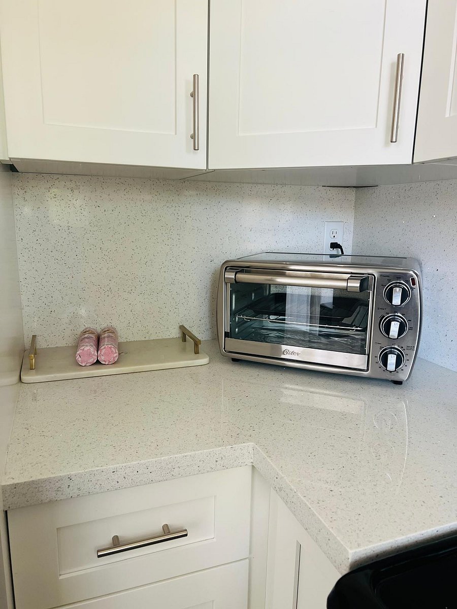 Sleek toaster oven ready for Cuban toast or midnight snacks.