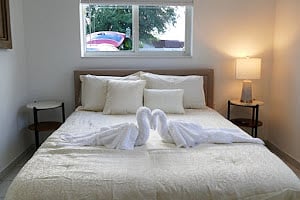 First Bedroom with a Queen bedroom with a big closet,75  inch tv samsung