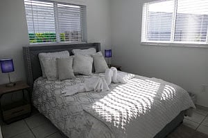 Second Bedroom with Queen Bedroom with a big closet 65 inch tv samsung