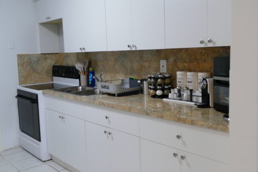Kitchen with all the appliances to cook , wine and dine