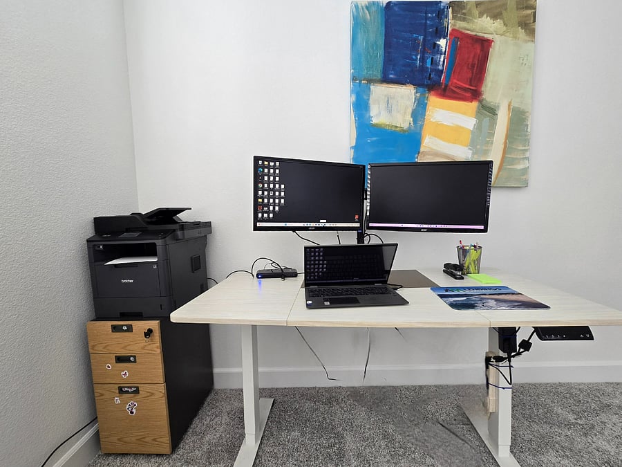 Work station equipped with dual monitors and printer