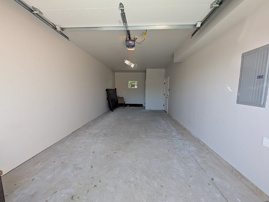 Large single garage with plenty of space for storage.