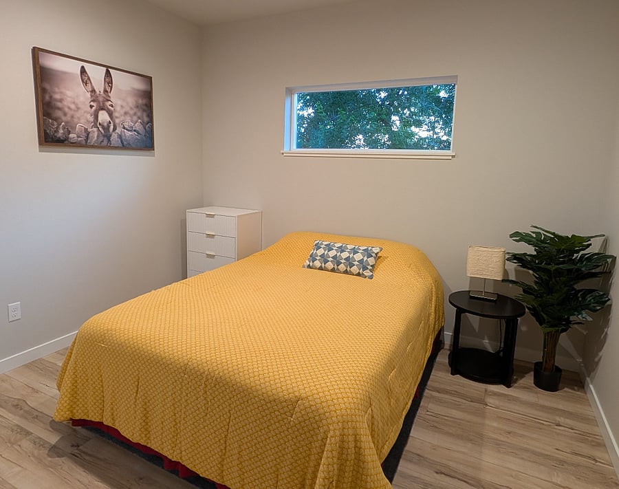 Bedroom #2: Queen sized bed with dresser and large closet.
