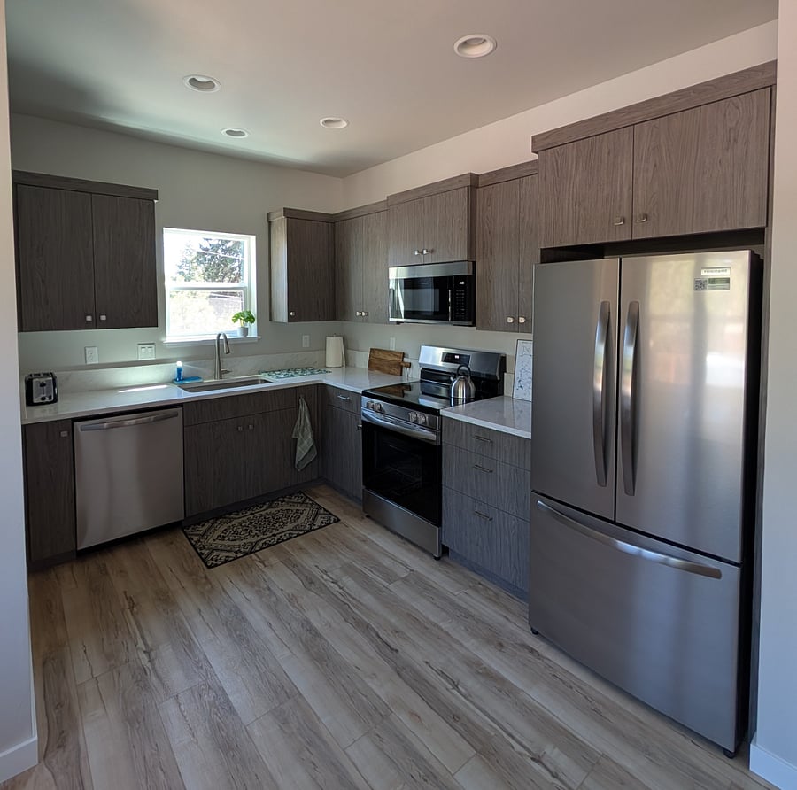 Kitchen with brand-new appliances, full sized fridge, plenty of storage, microwave, coffee pot, and utensils/pots/pans included