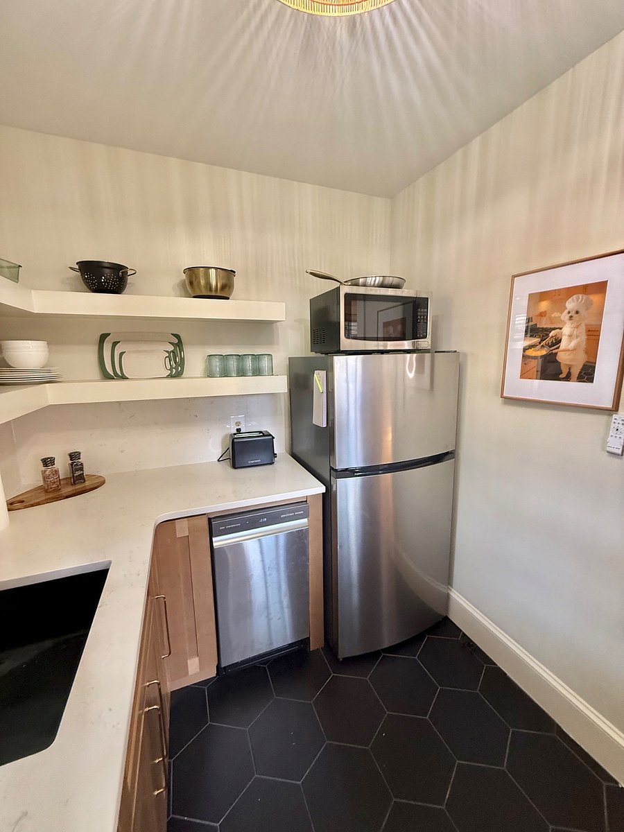 Microwave and all the cooking utensils and cookware 