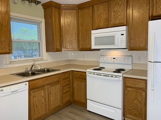 Eat-in kitchen with dishwasher and microwave.