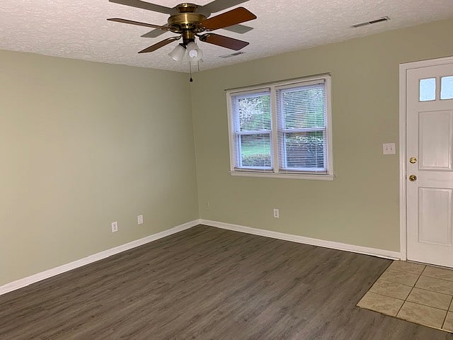 Living Room - will be furnished with a sofa, coffee table, console, lamp, smart TV and a large area rug.