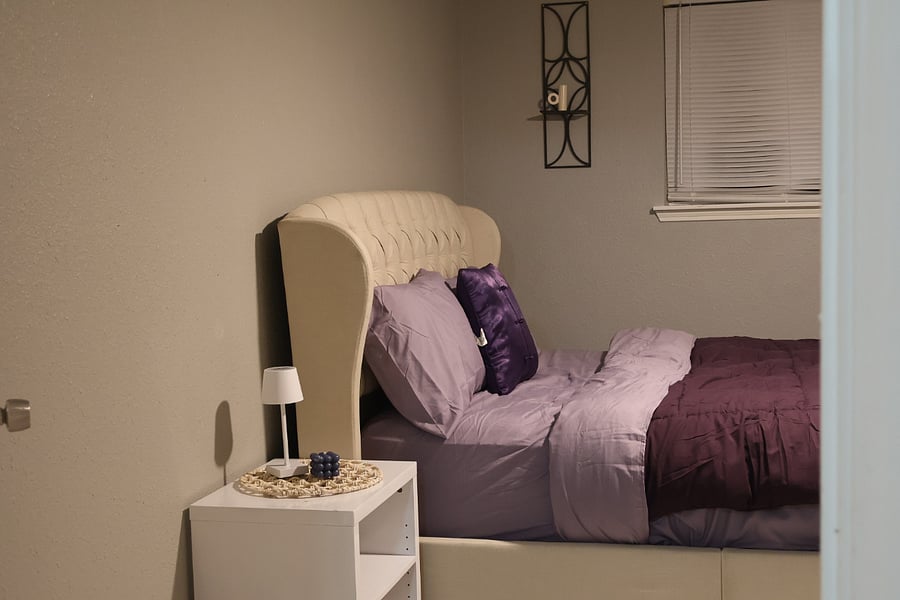 Purple bedroom at the entrance 