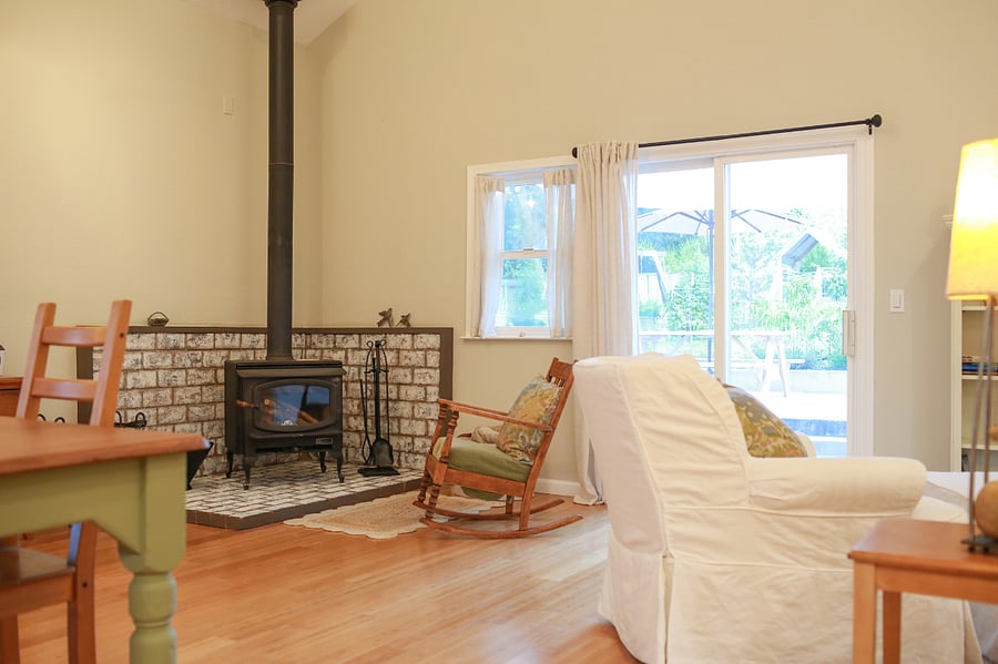 cozy woodstove and a sweet spot to read your favorite book