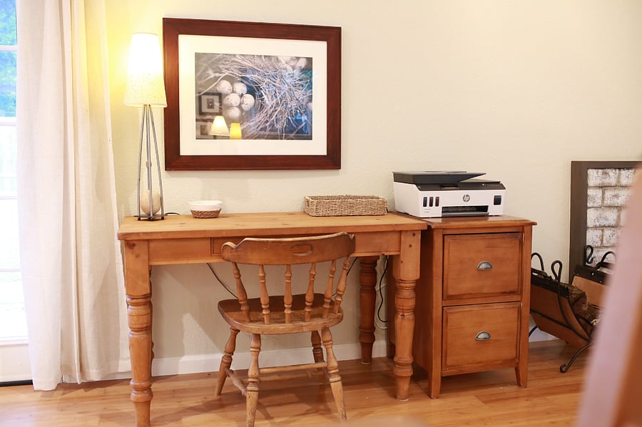 dedicated work space with printer and places to plug in