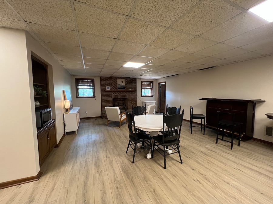 Basement. Fireplace new paint and LVP