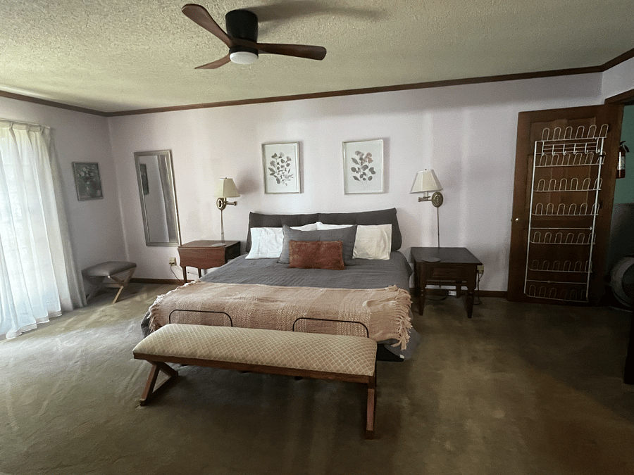 Master Bedroom with private bath over looking the lake