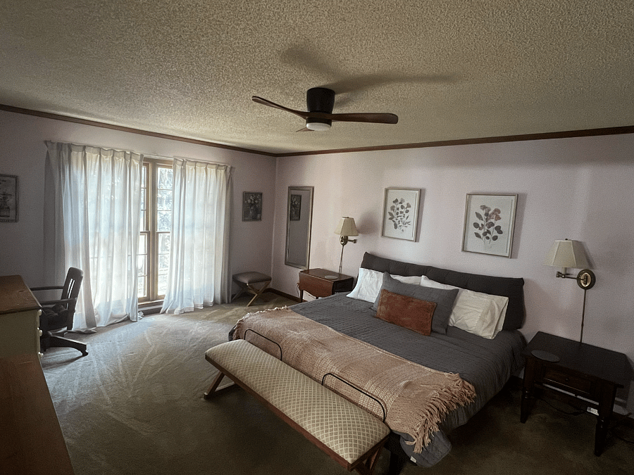 Master Bedroom with private bath over looking the lake