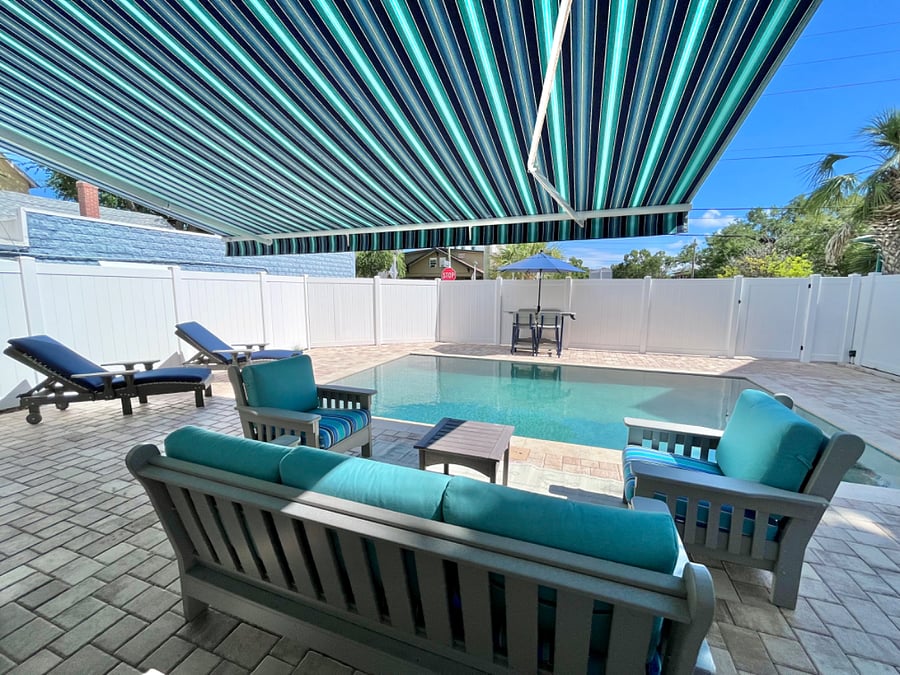 Remote control Motorized retractable awning for shade while chilling out on the patio.