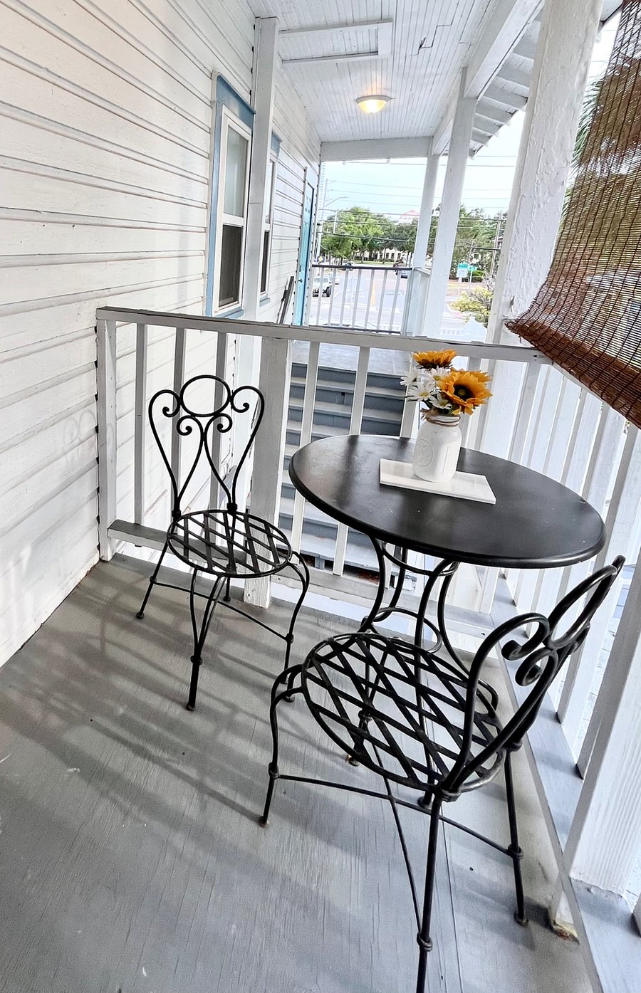 Close up of bistro table & chairs.