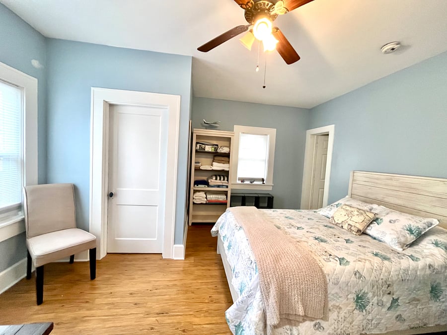Bedroom 2 has queen bed, closet and ceiling fan light.