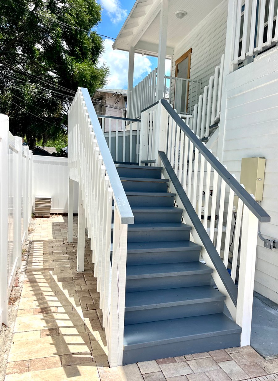 Stairway from patio/pool to apartment.