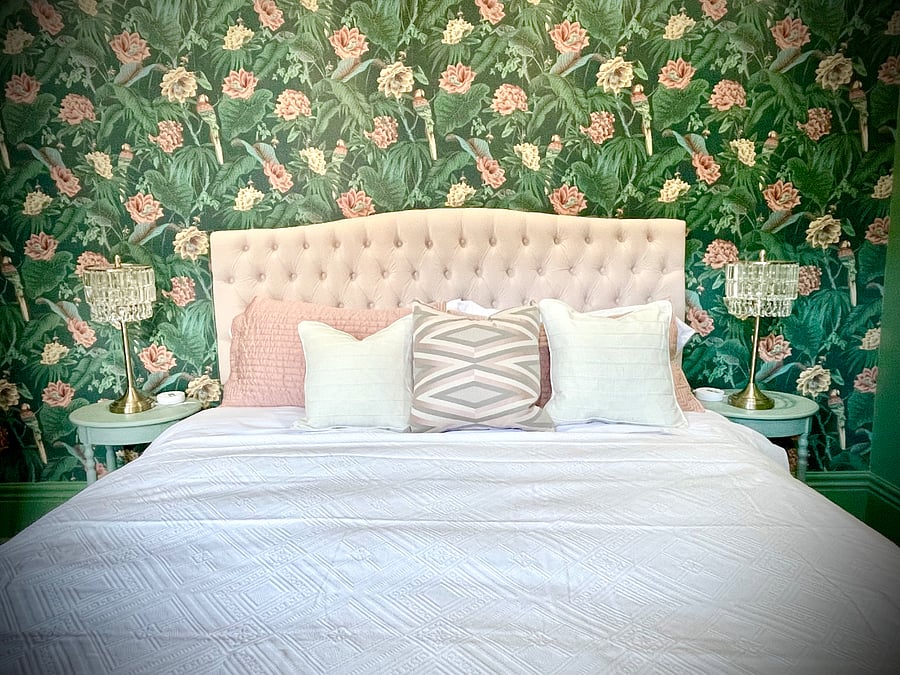 Independent third bedroom suite with kitchenette, king bed, and en suite bathroom. 