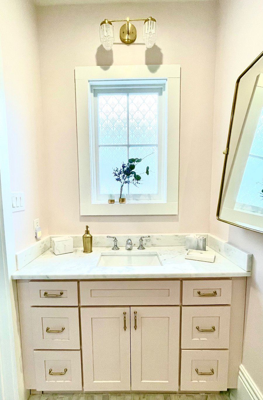 Independent third bedroom suite with kitchenette, king bed, and en suite bathroom. 